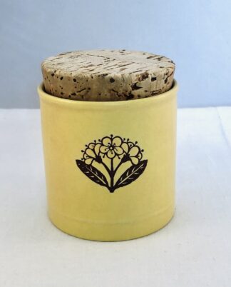 Krukke med korklåg.