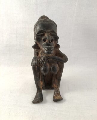 Afrikansk kvindefigur.