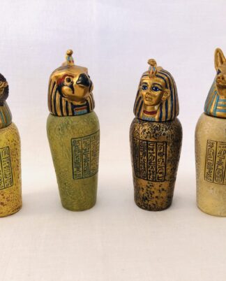 4 mini kanopiske krukker.