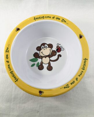 Skål med abe og mariehøne.