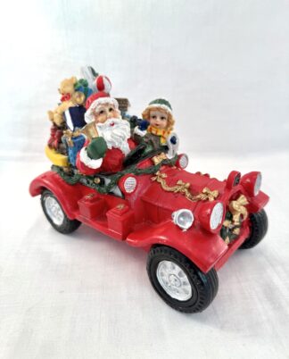 Julemand i bil figur.